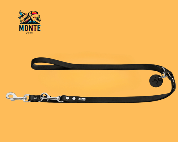 Hundeleine Hunter Schwarz 200 cm von MONTE PETS auf orangefarbenem Hintergrund.